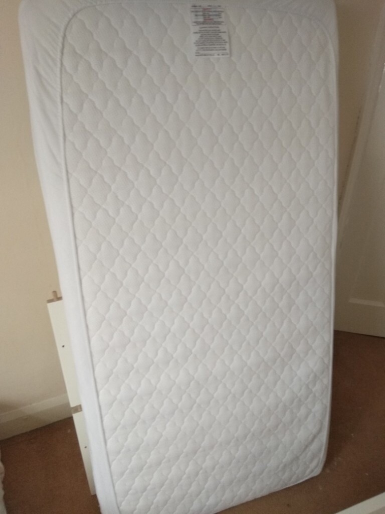cot bed mattress protector 140 x 70